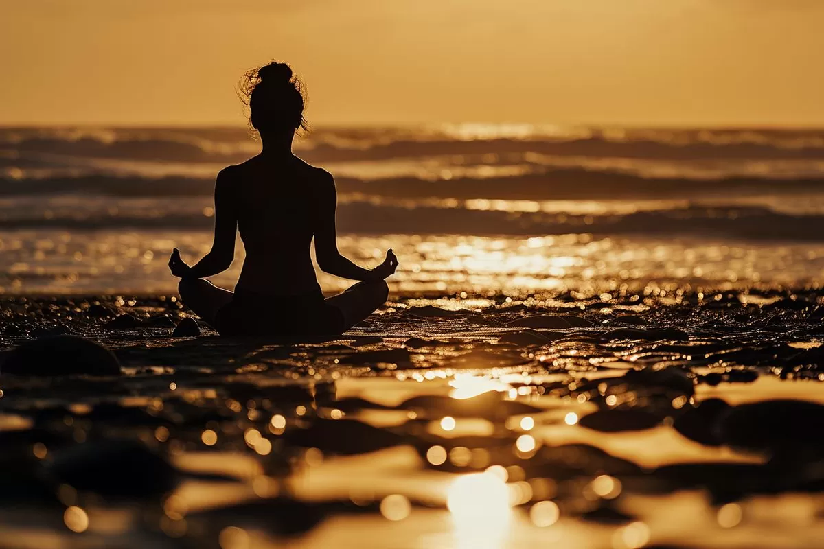 Relaxation and meditation with a majestic silhouette during a yoga session by the beach